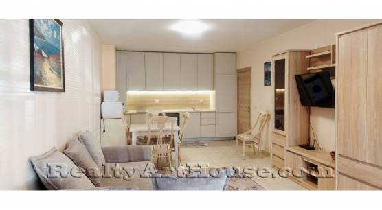 Ново строителство, обзаведен, просторен непреходен 2-стаен апартамент с голяма тераса